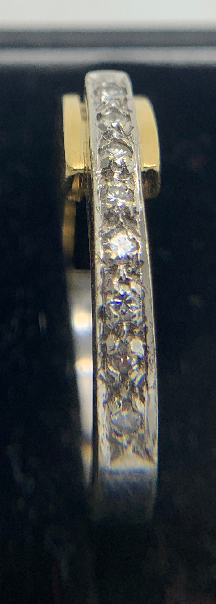 An 18ct white and yellow gold ring set with 8 diamonds. Size M, 6.2gms.Condition ReportGood - Image 3 of 3
