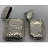Two silver vesta cases with foliate scroll engraving Chester 1898 maker William Aitken and Chester