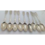 Nine silver teaspoons. Four London 1871 maker Henry Holland and 5 London 1835 maker John Henry and