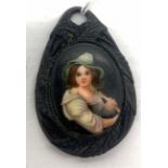 A 19thC jet pendant set with porcelain plaque. 6 x 4cms.Condition ReportGood condition.