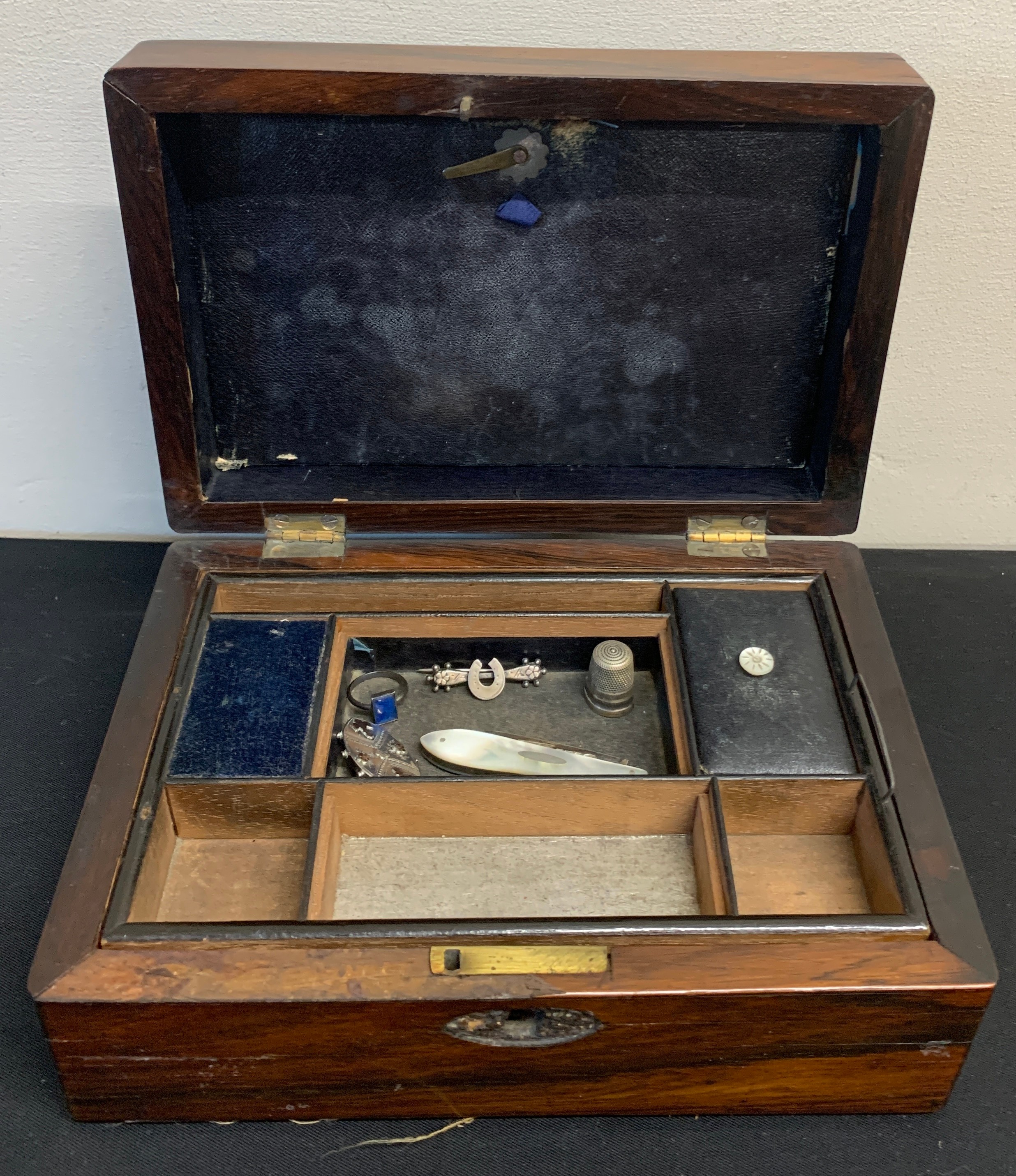 A 19thC rosewood jewellery box with lift out tray together with hallmarked silver jewellery etc.