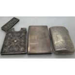 A hallmarked silver cigarette case with foliate scroll engraving Chester 1899 maker William