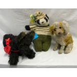 Three soft toys to include a clothed panda 36cms h, a King Charles Spaniel and a black Scottie dog