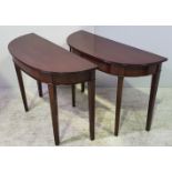 A PAIR OF LATE 19TH CENTURY MAHOGANY DEMI LUNE SIDE TABLES, with reeded detail to the edge, raised