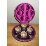 A GOOD QUALITY LATE 19TH CENTURY CASED SET OF SILVER SALTS AND SPOONS, with gilt interiors, each