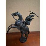 A BRONZE SCULPTURE OF A HORSE & WARRIOR, horse with legs rearing, 22 inches tall approx