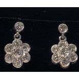 A BEAUTIFUL PAIR OF 18CT WHITE GOLD DIAMOND DAISY DROP EARRINGS, total diamond weight 1.50cts, the