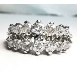 A 14CT TWO ROW DIAMOND AND WHITE GOLD PYRAMID RING, ring with two rows of bright clear round