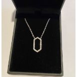 AN 18CT WHITE GOLD SIX SIDED DIAMOND PENDANT NECKLACE, with 18ct white gold chain, 0.3ct approx