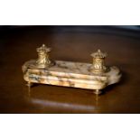 A 19TH CENTURY FRENCH ORMOLU AND MARBLE INKWELL, 30cm long