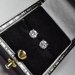 A PAIR OF 18CT WHITE GOLD DIAMOND STUD EARRINGS, stamped 750 Total carat weight: 0.50, the pair have