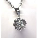 A STUNNING DIAMOND SOLITAIRE NECKLACE, set in a platinum mount, on a 9ct white gold loop pendant,