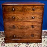 A FINE MAHOGANY 5 DRAWER CHEST, with rounded corners, 2 over 3 drawers each with rosewood turned