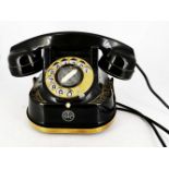 A 1930’S BAKELITE BELL COMPANY TELEPHONE, in working order, made by The Bell Telephone Company of