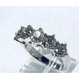 A CLASSIC 18CT WHITE GOLD FIVE STONE CLAW SET DIAMOND RING, diamond weight 2.80cts, clarity VS2