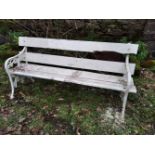 A 19TH CENTURY GARDEN SEAT with cast iron supports and wooden seat, 67inches wide approx in good