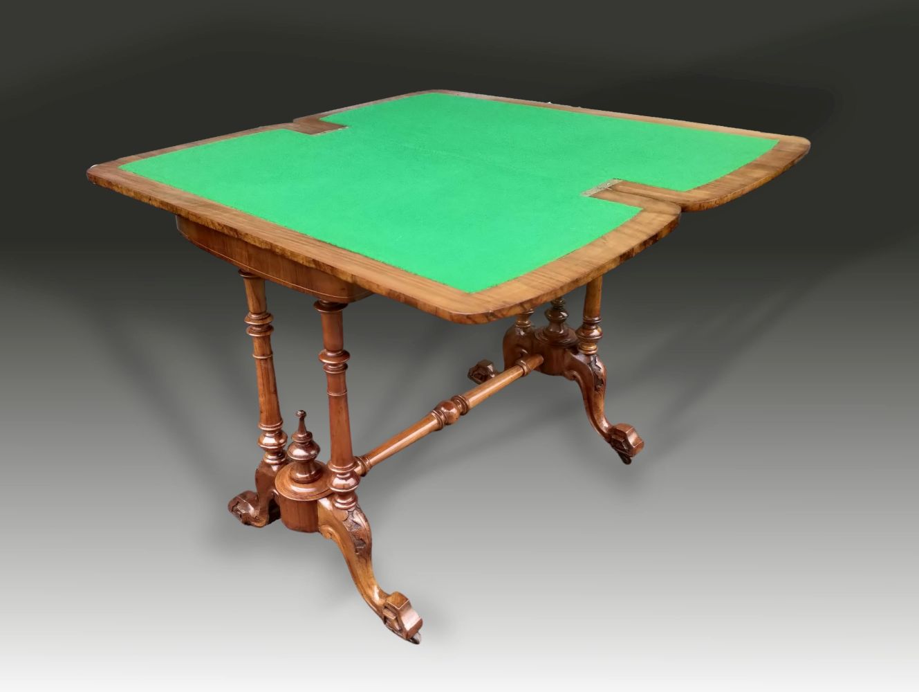 A GOOD QUALITY VICTORIAN WALNUT CARD TABLE, raised on stretcher base with four turned columns - Image 3 of 3