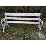 A 19TH CENTURY GARDEN SEAT with cast iron supports and wooden seat, 67inches wide approx in good