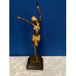 A FIGURE OF A DANCER, bronze ornament with gilt highlights, impressed artists name to base, D. H.