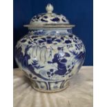 A BLUE & WHITE CHINESE JAR, with cover, with images of figures on horseback and floral motif all