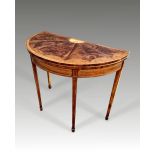 A VERY FINE 19TH CENTURY DEMI-LUNE CARD TABLE, in the Georgian style, with stunning flame mahogany