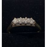 A STUNNING IRISH MADE 18CT YELLOW GOLD FOUR STONE DIAMOND RING