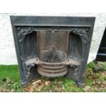 A 19TH CENTURY CAST IRON FIRE INSERT/SURROUND, with floral motif, 3ft wide x 38 inches tall approx.