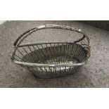 A RARE EARLY 20TH CENTURY SILVER PLATED WINE BASET, with basket w