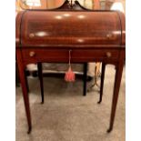 A VERY FINE EDWARDIAN CYCLINDER ROLL TOP BUREAU, dating circa 190