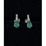 A PAIR OF 14CT WHITE GOLD EMERALD & DIAMOND DROP EARRINGS, with p