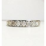 A STUNNING 18CT WHITE GOLD DIAMOND HALF ETERNITY BAND RING, 0.50