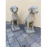 A PAIR OF STONE ORNAMENTS IN THE FORM OF LABRADORS, 22cm tall x 3