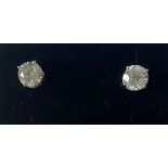 A PAIR OF 18CT WHITE GOLD CLAW SET DIAMOND STUD EARRINGS, 1.10 ct