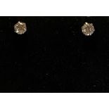 A PAIR OF 18CT WHITE GOLD DIAMOND STUD EARRINGS, .50cts