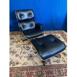 A MID CENTURY MODERN STYLE RECLINCING EASY CHAIR AND FOOT STOOL,