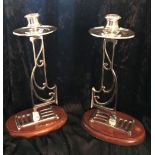 A PAIR OF STUNNING FRENCH ART DECO SILVER CANDLESTICKS, sitting o