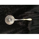 A SILVER & IVORY CASTOR with stunning pierced silver detail to bo