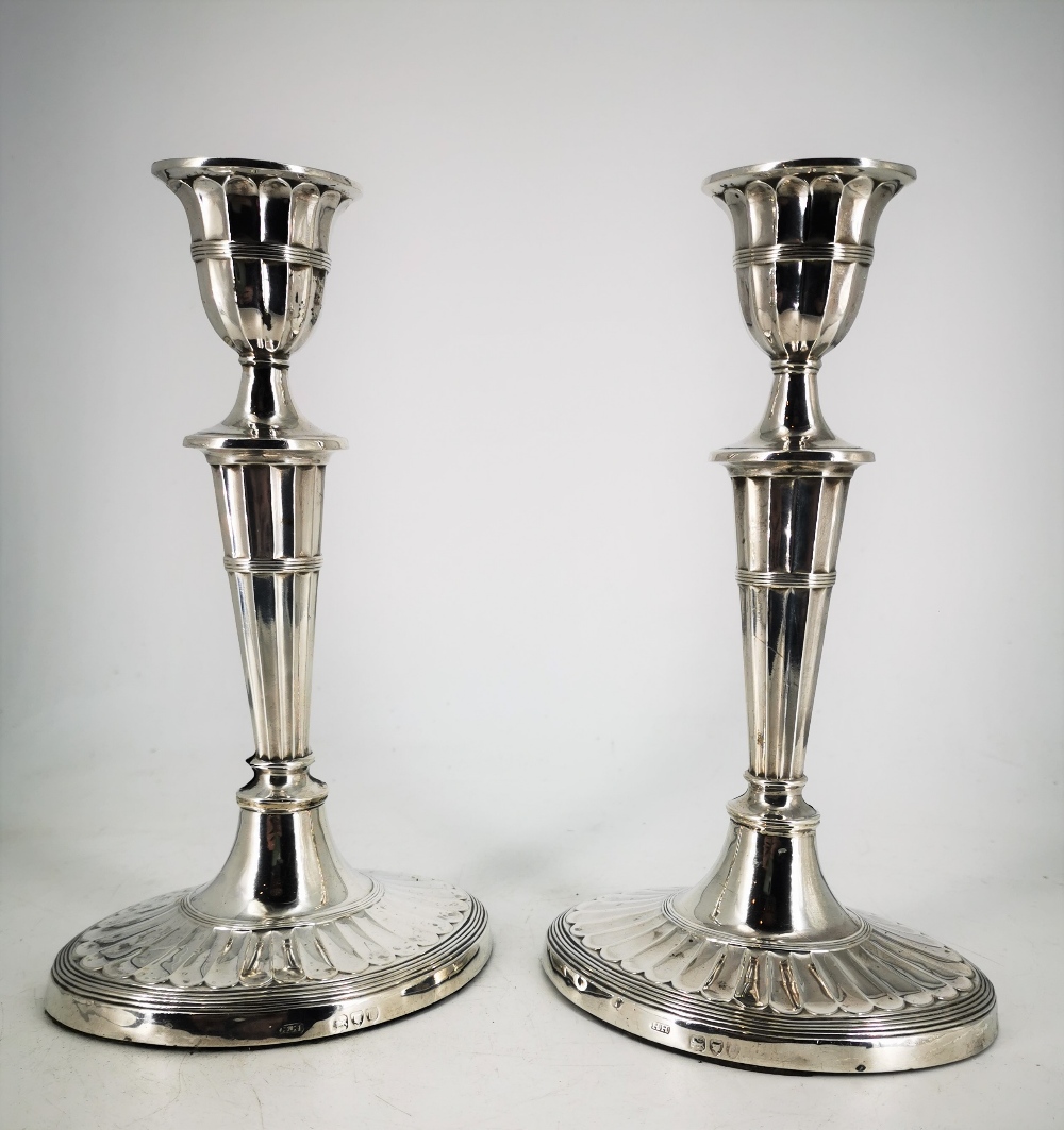 A FINE PAIR OF LATE 19TH CENTURY SILVER CANDLESTICKS, in the styl