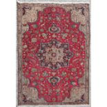 A GOOD VINTAGE HAND KNOTTED PERSIAN TABRIZ RUG, main field colour