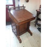 A GOOD QUALITY VICTORIAN DAVENPORT DESK, with turned column galle