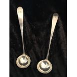 A PAIR OF LATE 19TH CENTURY SCOTTISH SILVER SAUCE LADLES, Glasgow