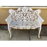 A CAST IRON GARDEN BENCH, with ram’s head design, 88cm high (back