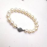 A VINTAGE 14CT WHITE GOLD & PEARL BRACELET, stamped 14k. Absolute