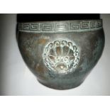 AN ANTIQUE CHINESE BRONZE BOWL, decorated with tiger heads, chara