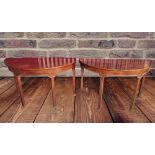 A PAIR OF DEMI LUNE MAHOGANY SIDE TABLES, raised on tapered leg,