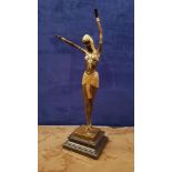 A FIGURE OF A DANCER, bronze ornament with gilt highlights, impre