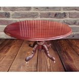 AN OVAL SHAPED VICTORIAN MAHOGANY BREAKFAST TABLE, raised on four