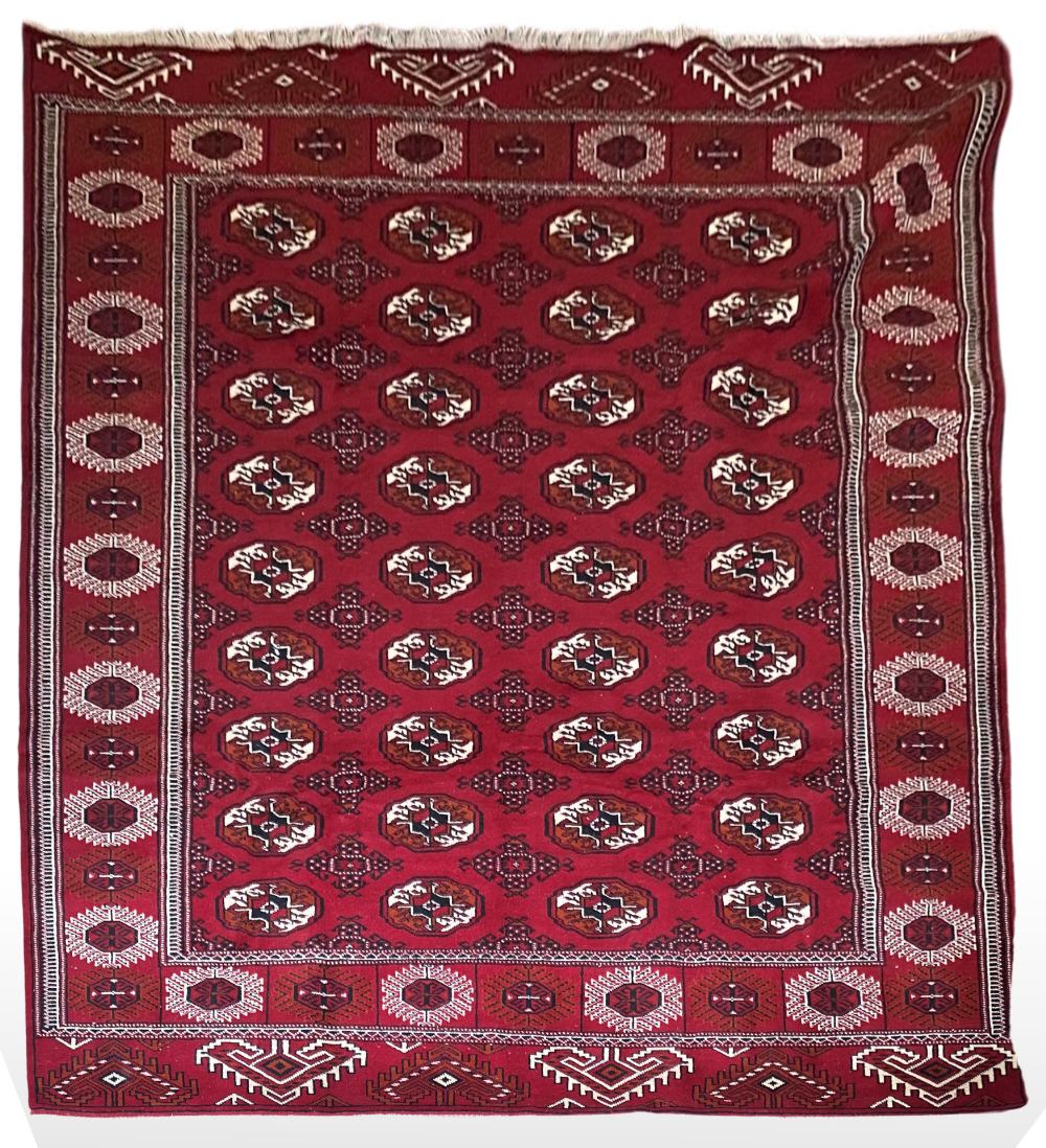 A PERSIAN TURKMAN RUG, Iran, hand woven on a hand loom, featuring