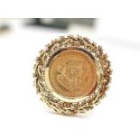 A SOLID FINE GOLD MEXICAN 22CT COIN SET IN A 14CT GOLD RING, Dos