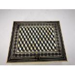 A MID 19TH CENTURY EBONISED AND IVORY VIZAGAPATAM BOX, decorated with a geometric 3D pattern, the